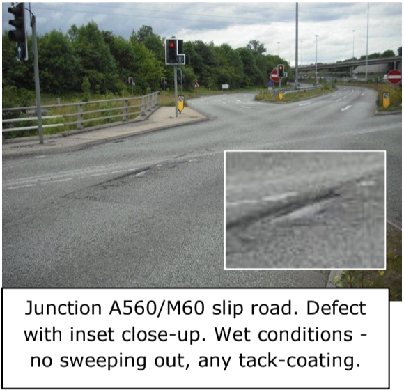 Traffic junction with pothole defect needing repair